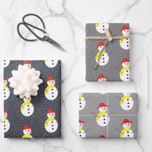 Cute snowman and snow on gray wrapping paper sheets