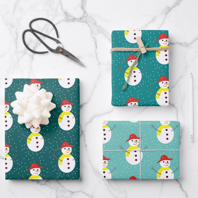 Cute snowman and snow on teal blue wrapping paper sheets (Front)