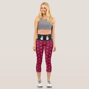 Cute snowman and snowflake pattern on burgundy capri leggings