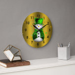 Cute Snowman in Green Velvet on Gold Christmas Large Clock<br><div class="desc">This cute Christmas clock features a jolly little snowman, dressed in green velvet vest and matching green top hat. All around him are stars and sparkles, and behind him is a shiny, metallic golden background. This clock would make a lovely and very festive addition to any home for Christmas this...</div>