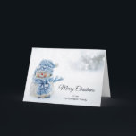 Cute Snowman in Winter Photograph Christmas Card<br><div class="desc">Christmas card with a cute photograph with a little snowman. Standing outside in the winter with snow falling all around. This cute little guy is dressed up in blue knitted outdoor clothing. Some white/gray bokeh flare in the background.</div>