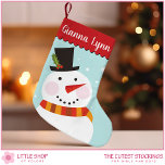 Cute Snowman Monogram Kids Small Christmas Stocking<br><div class="desc">Celebrate the holiday season with this charming Christmas stocking that features an illustration of a snowman wearing a top hat adorned with holly leaves and berries. The snowman, complete with a carrot nose, cozy winter scarf, and delicate snowflakes, is framed by a trendy scalloped edge border. This design will add...</div>