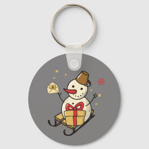 Cute Snowman On A Sled Keychain