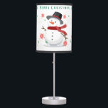 Cute Snowman  Snowflakes Merry Christmas Table Lamp<br><div class="desc">Adorable Table Lamp With Snowman And Snowflakes. Get into the holiday spirit with our Snowman and Snowflakes Table Lamp. Perfect for Christmas,  this lamp captures the charm of the season,  making your home shine with holiday joy. Shop today!</div>
