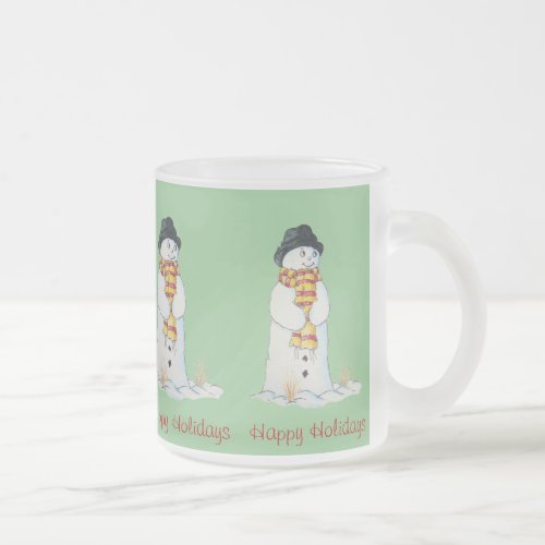 Cute snowman with Christmas stocking in the snow Frosted Glass Coffee Mug