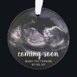 Cute Sonogram Photo Pregnancy Reveal Christmas Ornament<br><div class="desc">Are you expecting a baby and want a creative way to announce it? Reveal your pregnancy to your family and close friends with this cute ultrasound ornament. This modern design features your sonogram and a text overlay with the words, "coming soon" along with baby's name and due date. Add the...</div>