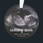 Cute Sonogram Photo Pregnancy Reveal Christmas Ornament<br><div class="desc">Are you expecting a baby and want a creative way to announce it? Reveal your pregnancy to your family and close friends with this cute ultrasound ornament. This modern design features your sonogram and a text overlay with the words, "coming soon" along with baby's name and due date. Add the...</div>