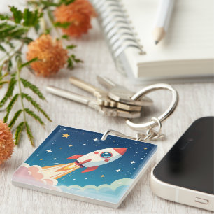 Cute space rocket blasting off keychain