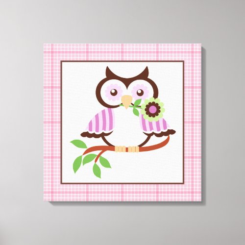 Cute spring owl on a branch wrapped canvas print