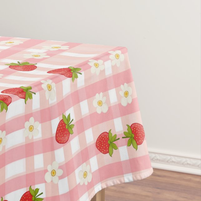 Cute strawberry and flowers on a pink gingham tablecloth (In Situ)