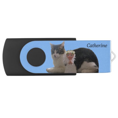 Cute tabby cat and angel on light blue flash drive