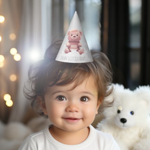 cute teddy bear on pile of diapers 1st birthday party hat