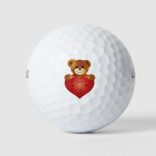 Cute teddy bear with heart  golf balls