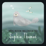 Cute 'This Book Belongs' Ocean Seal Kids Bookplate<br><div class="desc">This whimsical kids bookplate 'this book belongs' sticker design features a unique ocean seal illustration with seaweed,  fish,  and turquoise blue waves. This lovely design also features a place for you to add your child’s name. The perfect sea-themed design for your little one's school supplies!</div>
