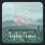 Cute 'This Book Belongs' Ocean Seal Kids Bookplate<br><div class="desc">This whimsical kids bookplate 'this book belongs' sticker design features a unique ocean seal illustration with seaweed,  fish,  and turquoise blue waves. This lovely design also features a place for you to add your child’s name. The perfect sea-themed design for your little one's school supplies!</div>