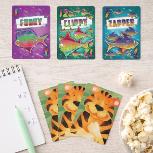 Cute tiger kids playing cards