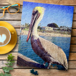 Cute Trendy Coastal Beach Pier Pelican Bird Photo Jigsaw Puzzle<br><div class="desc">This happy pelican perched on a railing overlooking a California beach screams “vacation ready”. Pleasantly pass the time while you drift back to warm ocean breezes whenever you work on this cute, friendly coastal pelican jigsaw puzzle. Makes a great gift for someone special! Comes in a special gift box. You...</div>