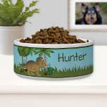 Cute Triceratops Dinosaur Tropical Forest And Name Bowl<br><div class="desc">Destei's original cartoon illustration of a cute brown color Triceratops dinosaur standing in a tropical world including a blue sky,  trees,  some plants and green grass. There is also a personalizable text area for a name or other custom text.</div>