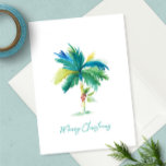Cute Tropical Palm Tree Christmas Greeting Card<br><div class="desc">Send warm wishes from the coast with this cute and sunny tropical Christmas card, featuring a vibrant watercolor palm tree adorned with a festive red poinsettia. Set against a crisp white background, the card includes the phrase "Merry Christmas" in modern turquoise brush script—perfect for capturing the laid-back charm of a...</div>