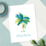 Cute Tropical Palm Tree Watercolor Beach Christmas Card<br><div class="desc">This beach theme watercolor Christmas card features a replica of my original hand painted palm tree with red poinsettia on a crisp white background. The words Merry Christmas are set in a modern brush script typography in turquoise blue. The inside is a solid light tropical green color and is blank...</div>