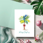 Cute Tropical Palm Trees Watercolor Christmas Card<br><div class="desc">This beach theme watercolor Christmas card features a replica of my original hand painted palm tree with red poinsettia on a crisp white background. The words Merry Christmas are set in a modern brush script typography in turquoise blue. The inside is a solid light tropical green color and is blank...</div>