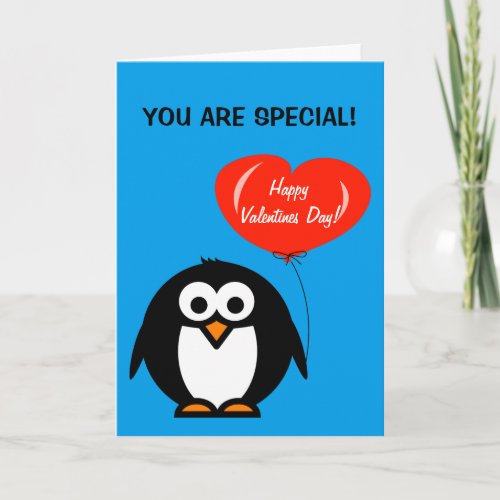 Cute Valentines Day card with penguin and heart