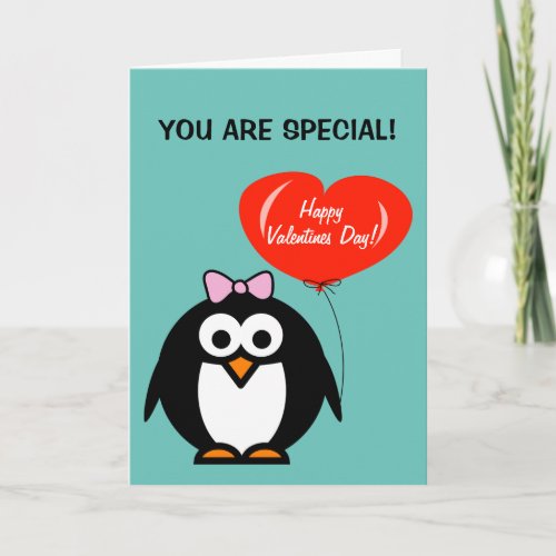 Cute Valentines Day card with penguin and heart