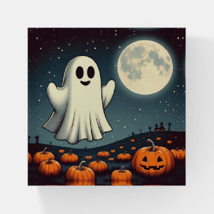 Cute, vintage ghost & pumpkin halloween art paperweight