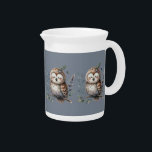 Cute Watercolor Owl with Floral Woodland Style Beverage Pitcher<br><div class="desc">This charming illustration features a sleepy, fluffy owl perched serenely on a branch, its eyes closed in peaceful rest. Soft watercolor textures and gentle earthy tones bring warmth to the design, making it ideal for cozy, nature-themed spaces. Surrounded by delicate leaves, muted florals, and a fluttering butterfly, the scene captures...</div>
