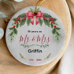 Cute wedding Anniversary Christmas greenery Ceramic Ornament<br><div class="desc">Celebrate love and the holiday season with this Cute Wedding Anniversary Christmas Greenery Ceramic Ornament. Featuring charming festive greenery accents, this ornament brings warmth, romance, and holiday cheer to your Christmas tree. Perfect for commemorating a wedding anniversary, it can be personalized with names or a special date to create a...</div>