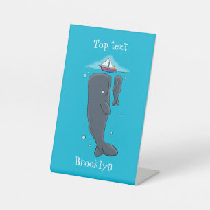 Cute whales and sailing boat cartoon illustration pedestal sign