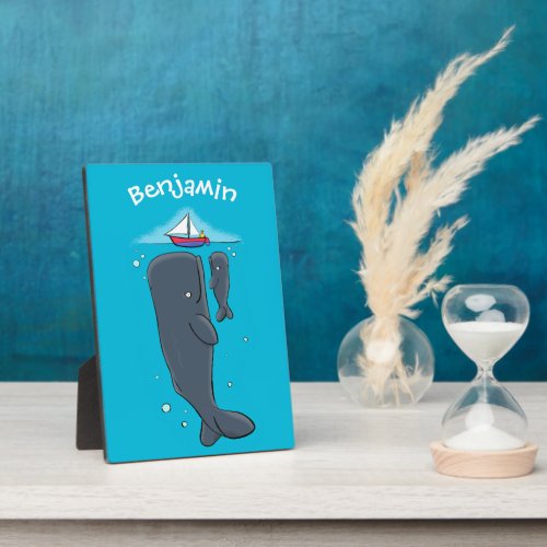 Cute whales and sailing boat cartoon illustration plaque