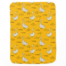 Cute white and yellow geese