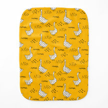 Cute white and yellow geese