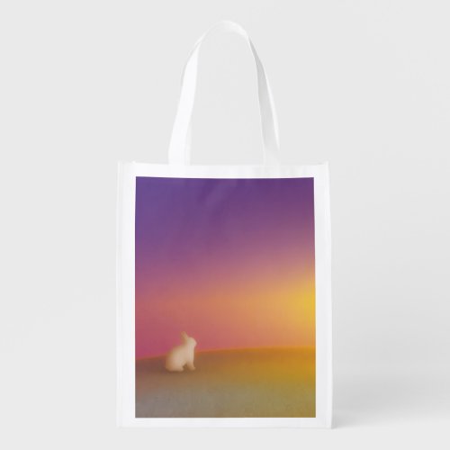 Cute White Bunny Rabbit on Grassy Hill at Sunrise Grocery Bag