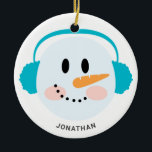 Cute Winter Personalized Snowman Face Christmas  Ceramic Ornament<br><div class="desc">Cute Winter Personalized Snowman Face Christmas Ceramic Ornament.  Design has hat and carrot nose snowman blue ear muffs. Great Christmas gift for family and friends.</div>