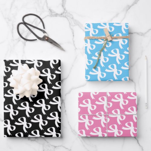 Cute wrapping paper sheets with white bow ties