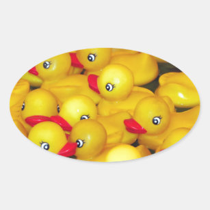 Cute yellow rubber duckies oval sticker