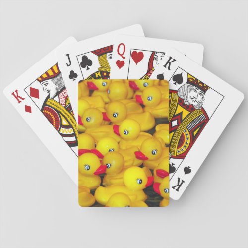 Cute yellow rubber duckies playing cards