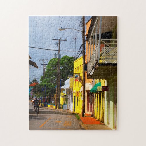 Cycling down Queen Street Speightstown Barbados Jigsaw Puzzle