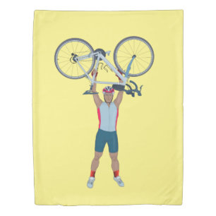 Cyclist Lifting a Bicycle Duvet Cover