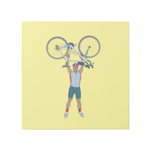 Cyclist Lifting a Bicycle Gallery Wrap