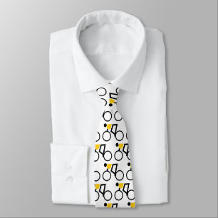 Cyclist riding his bicycle black and yellow neck tie