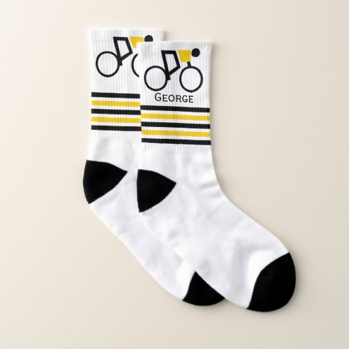 Cyclist riding his bicycle black yellow stripes socks