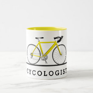 Cycologist text and yellow bicycle Two-Tone coffee mug