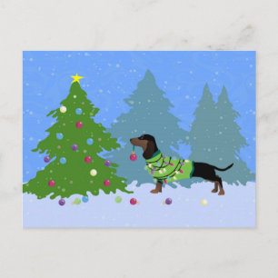 Dachshund Decorating Christmas Tree in forest Holiday Postcard