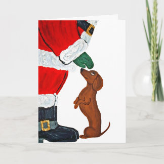 Dachshund getting a pet from Santa Card