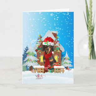 Dachshund in snow with Christmas gifts Card