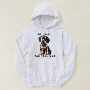 Dachshund Puppy Sitting and Looking with Innocent Hoodie