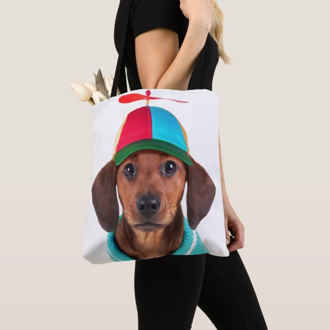 Dachshund Puppy Wearing Propeller Hat Tote Bag (Close Up)